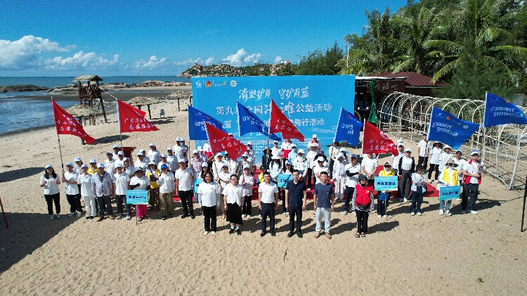 图为第九届全国净滩公益活动（江门分会场）活动大合照2.jpg
